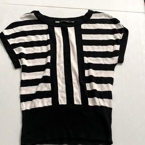 Black and white shirt sleeved sweater